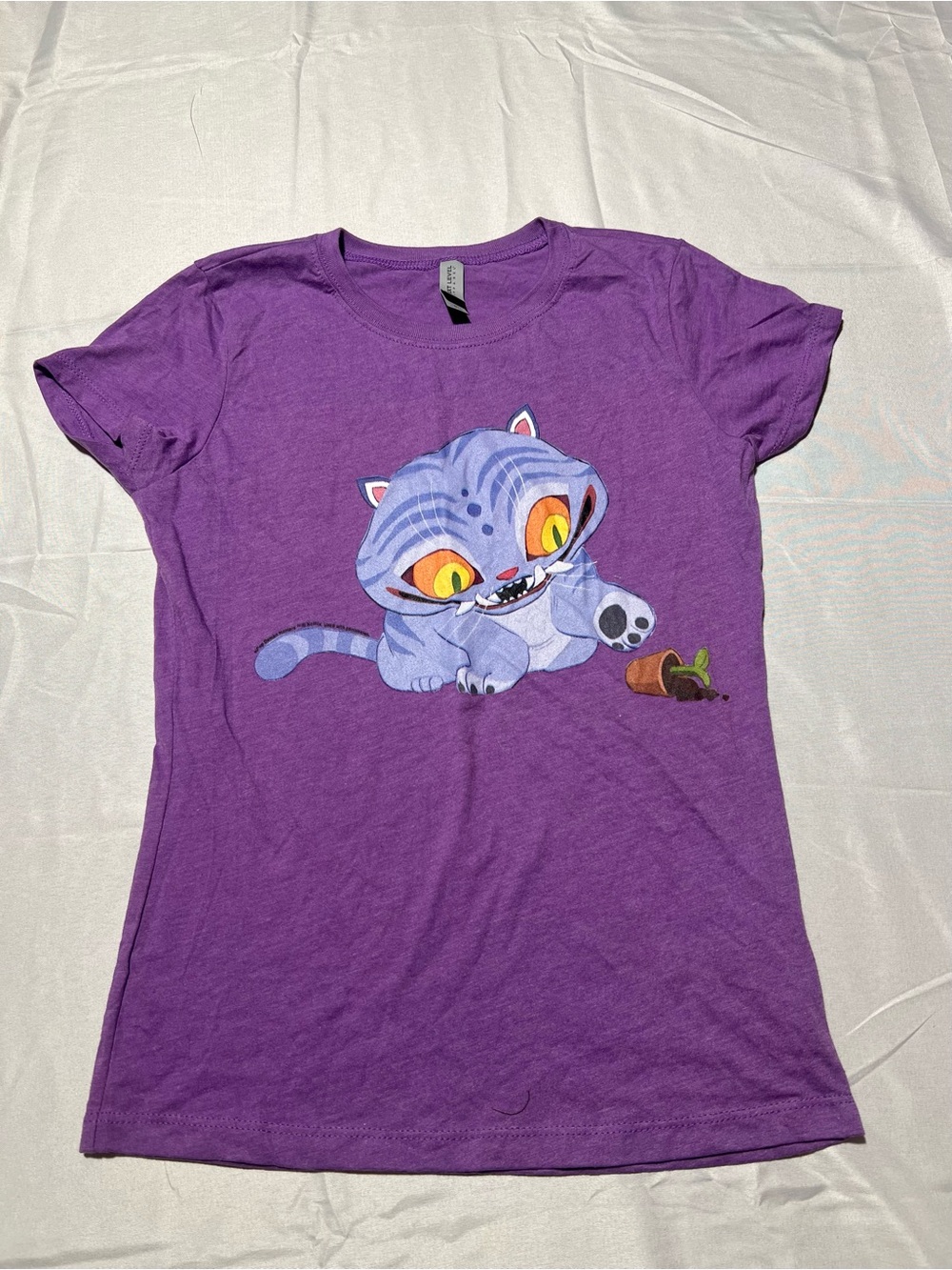 Next Level Apparel Purple Tee with Playful Blue Cat Graphic